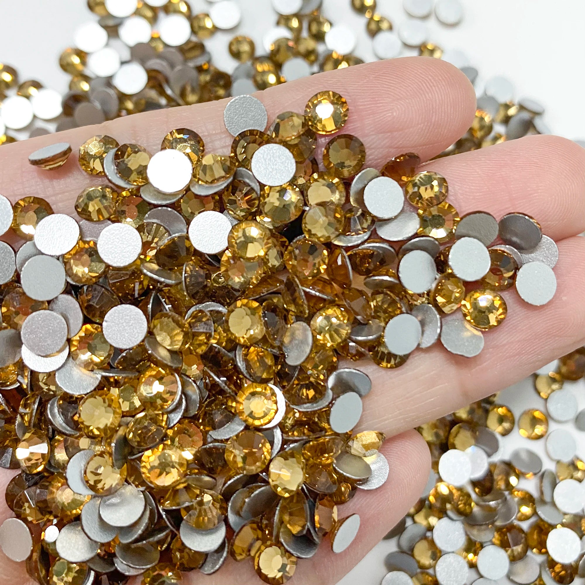 Factory Wholesale SS3-SS20 Rhinestones Colorful Non Hot-Fix Round Glitter Crystal Flatback Rhinestone 3D Nail Art Decorations