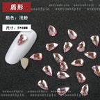 New hot-selling nail art rhinestones, light pink gold base, flat bottom, irregular shape, marquise, teardrop glass rhinestones, DIY nail art accessories wholesale.